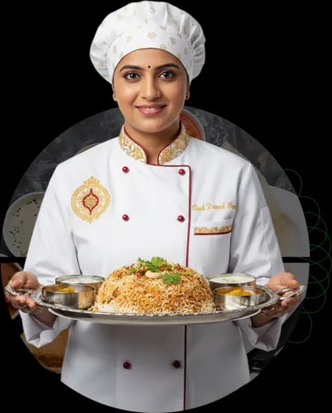 Indian chef holding a traditional thali platter